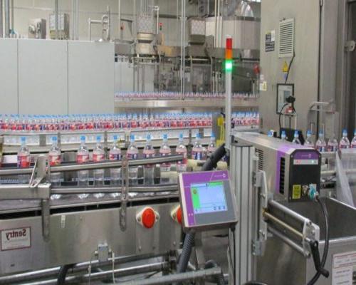 Bottled water packaging line in operation